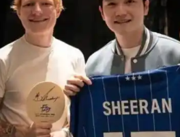 黄老板与樊振东互赠球衣和球拍：体育与商业的跨界合作